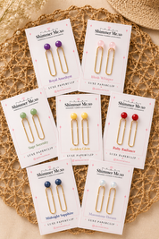 Set of Shimmer Mexo luxe paperclip packaging on a textured surface