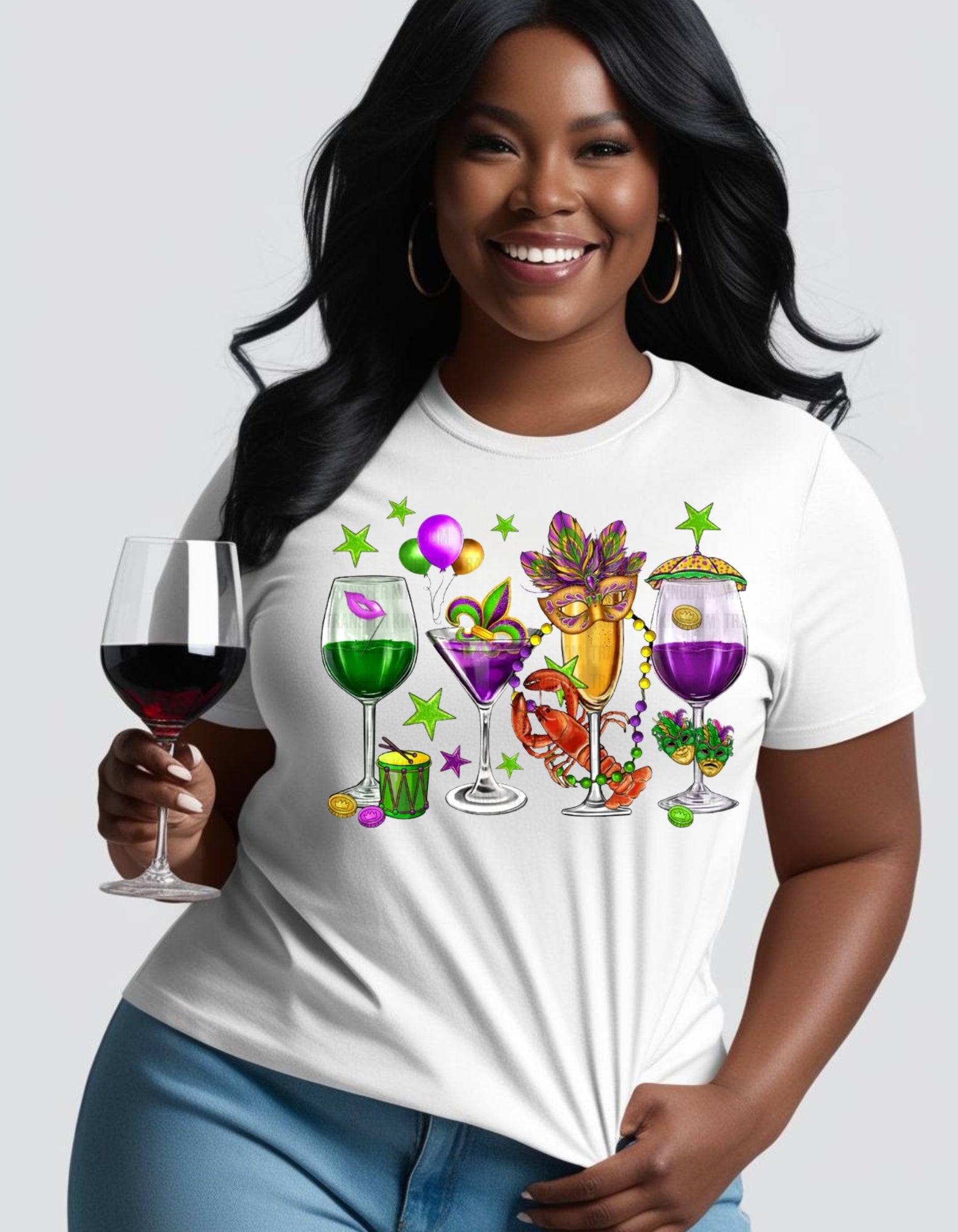 A woman holding a glass of wine and wearing a white round-neck t-shirt with a graphic of wine glasses and crawfish, indicating a wine-themed design.