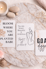 Motivational cards on a marble surface with decorative elements