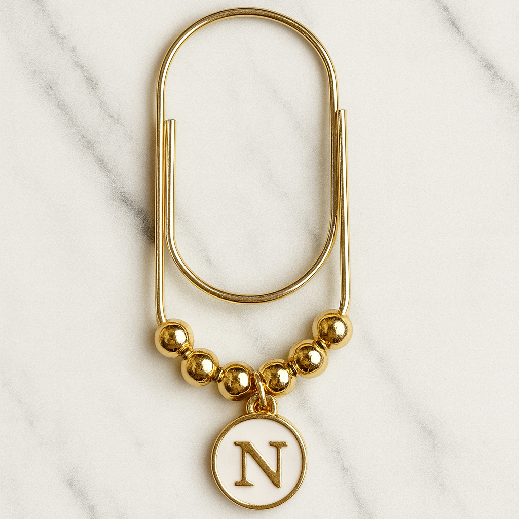 bookmark gold white initial